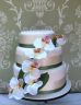 wedding cake, flowers to match brides