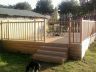 large raised deck with handrails