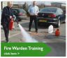 Attendee carrying out fire extinguisher training