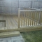deck with recessed step for door opening