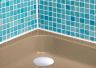 'Storm Grey' shower tray with blue tiles - bathroom interior design idea by Colour Trays.