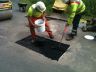 permanent pothole repair being carried out in carriageway using GreenPatch Permanent Pothole 