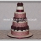 Classic four tier stack design with the contemporary look of fresh roses