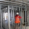 K.J. Hill Builders fix metal stud partitions in a block of flats