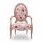 The contemporary design of this armchair offers a modern twist on the traditional style.